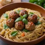 Try these creamy lemon chicken ricotta meatballs for a delicious, easy-to-make dinner. Perfectly tender meatballs with a zesty lemon cream sauce!